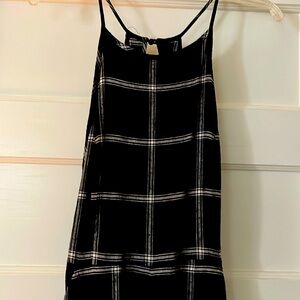 A one piece female linen romper size 8 by urban outfitters.  Gently worn.